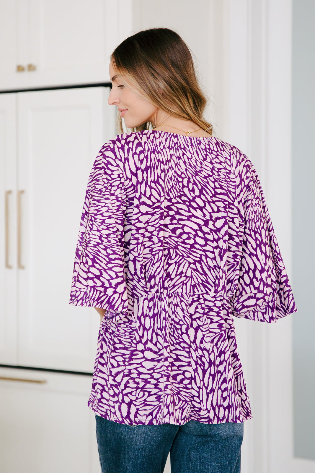 Dearest Dreamer Peplum Top in Painted Purple Ave Shops