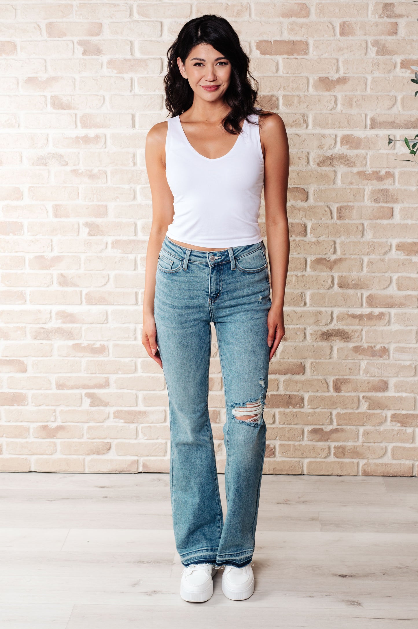 Isla Mid Rise Distressed Released Hem Bootcut Jeans Ave Shops