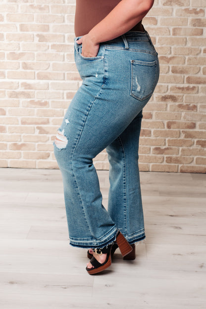 Isla Mid Rise Distressed Released Hem Bootcut Jeans Ave Shops