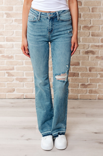 Isla Mid Rise Distressed Released Hem Bootcut Jeans Ave Shops