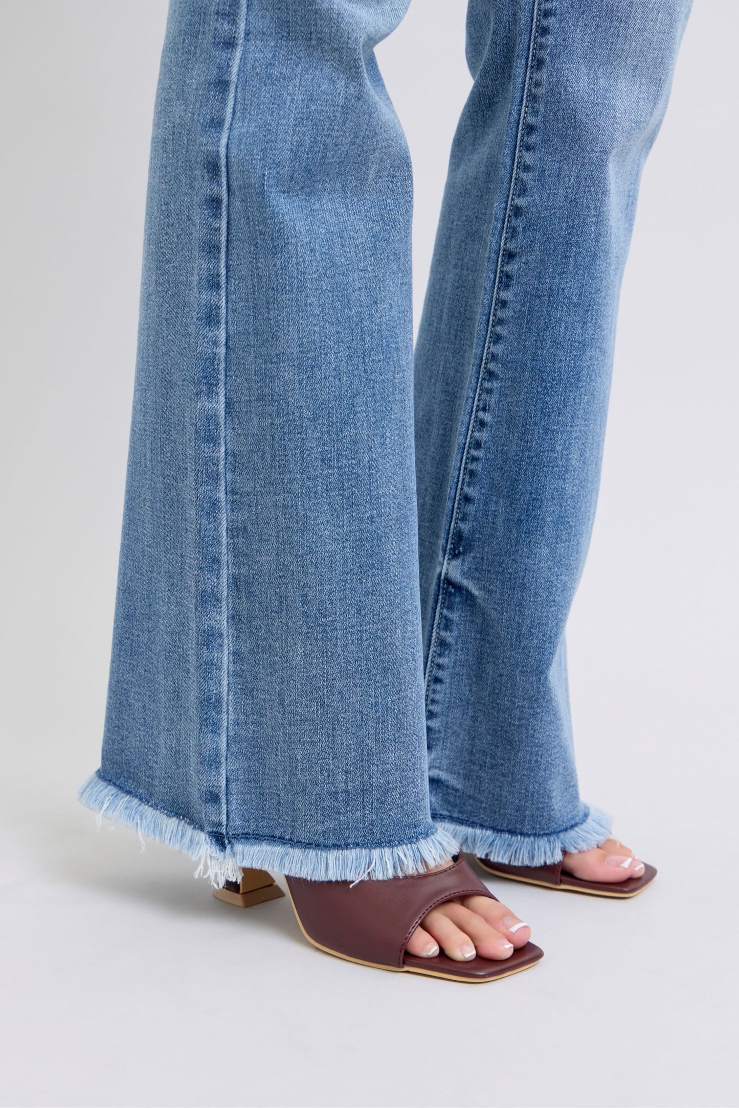 Judy Blue Full Size Raw Hem High Rise Bootcut Jeans Trendsi