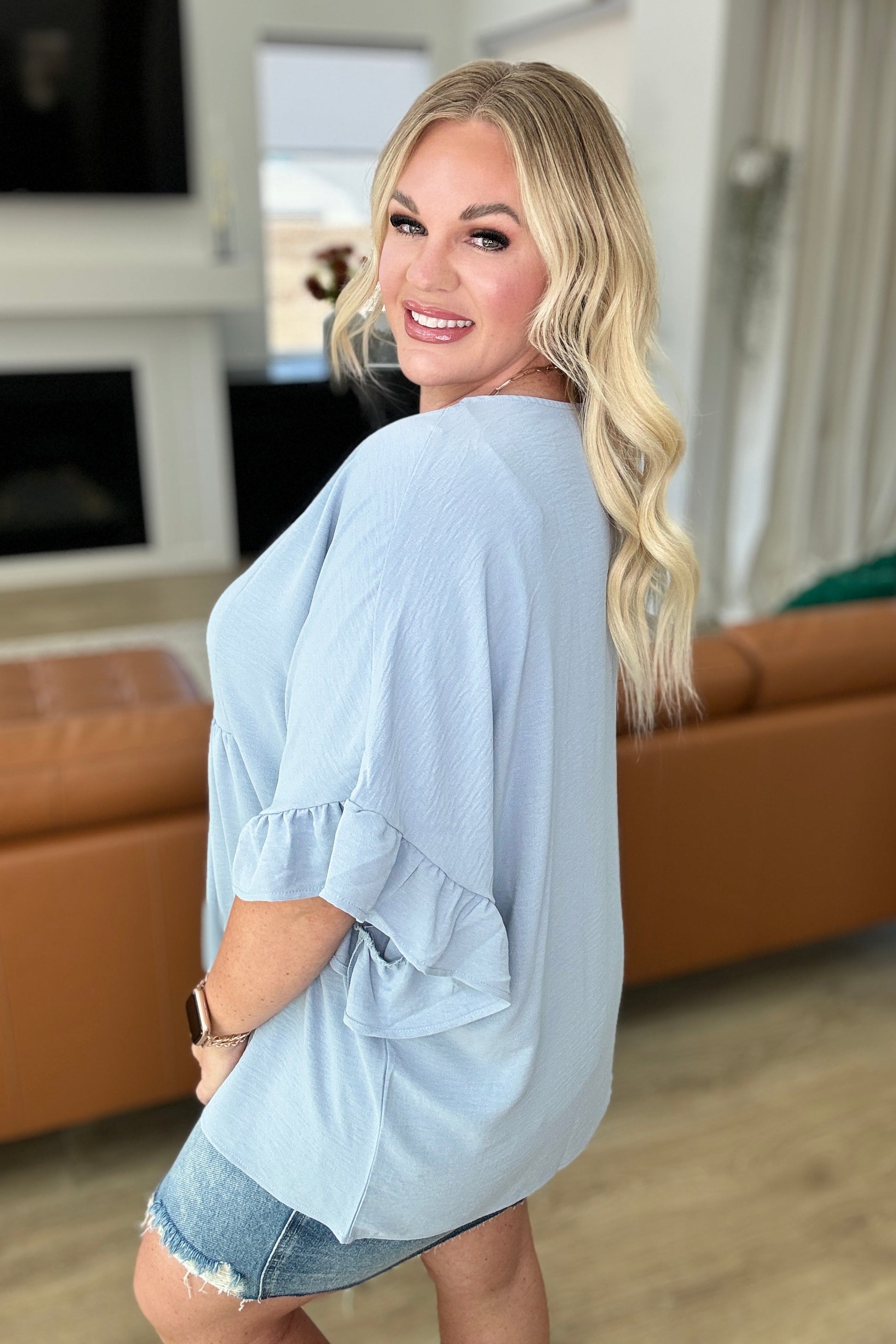 Airflow Peplum Ruffle Sleeve Top in Chambray Ave Shops