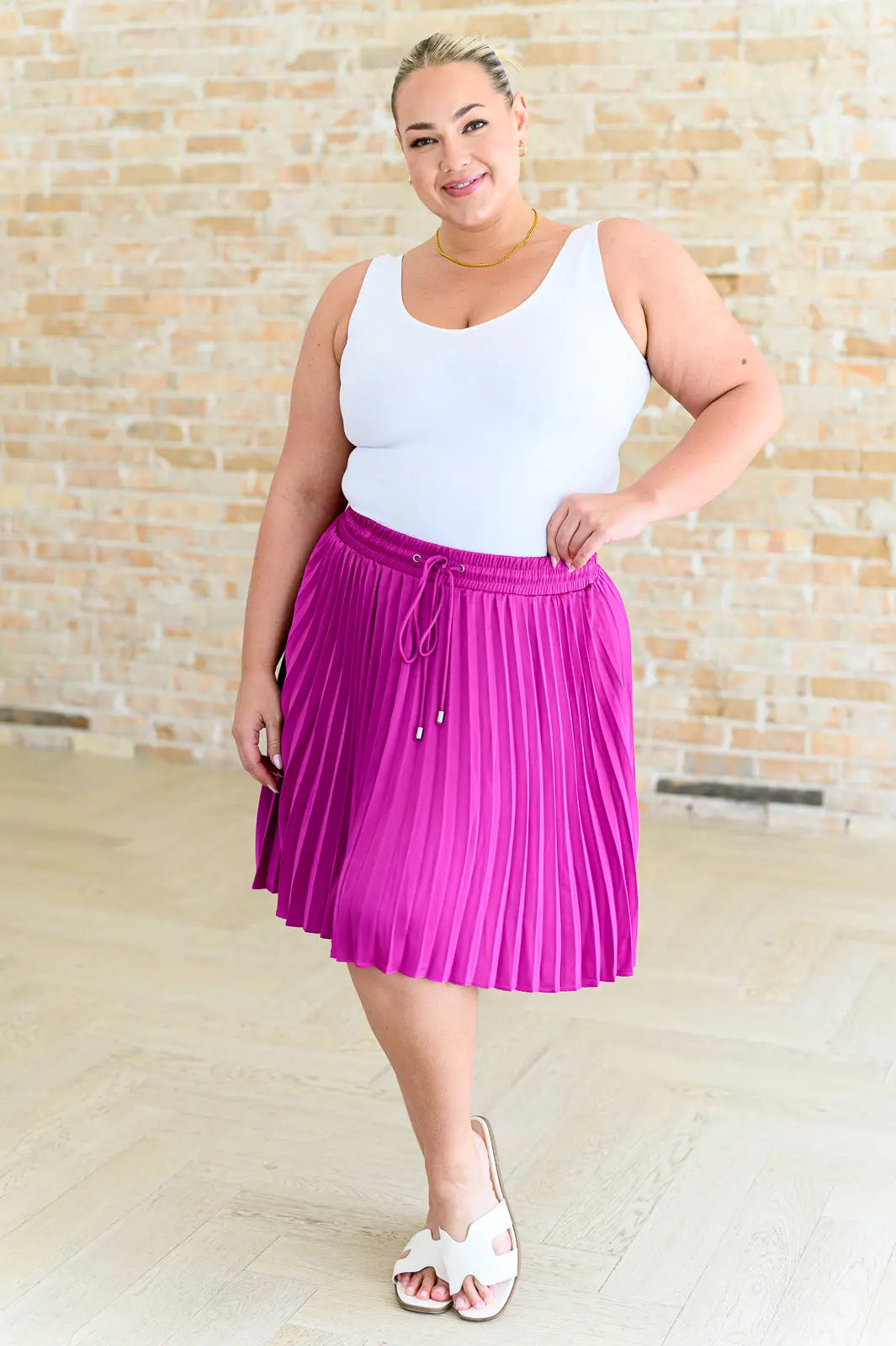 Just a Flirt Pleated Skirt in Magenta Ave Shops