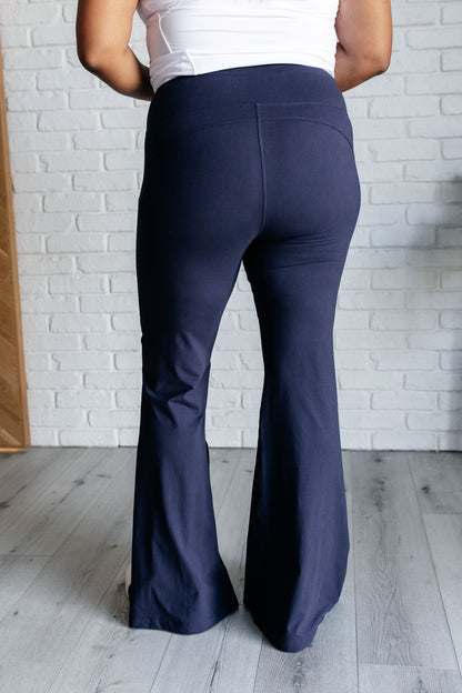 Stamina Stride Flare Leggings in Navy Ave Shops