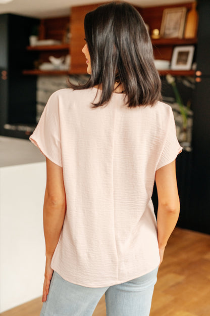 Frequently Asked Questions V-Neck Top in Blush Ave Shops